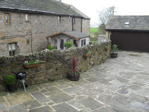 Dry Stone Wall with Hanging Baskets